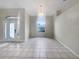 Bright dining room with tile floors and a chandelier at 1878 Algonquin Ave, Deltona, FL 32725