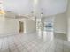 Spacious living area with high ceilings and tile floors at 1878 Algonquin Ave, Deltona, FL 32725