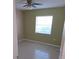 Spacious bedroom with tile floors and ceiling fan at 1902 Honour Rd # 9, Orlando, FL 32839
