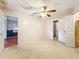 Bedroom with ceiling fan and closet at 31316 Saunders Dr, Tavares, FL 32778