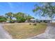 Ranch style home with lake access and circular driveway at 31316 Saunders Dr, Tavares, FL 32778