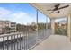 Screened balcony overlooking community and partial lake view at 3362 Robert Trent Jones Dr # 30307, Orlando, FL 32835