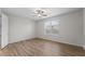 Spacious bedroom with hardwood floors and ceiling fan at 3362 Robert Trent Jones Dr # 30307, Orlando, FL 32835