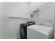 Laundry room with washer and dryer included at 3362 Robert Trent Jones Dr # 30307, Orlando, FL 32835