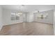 Spacious living room with hardwood floors and lots of natural light at 3362 Robert Trent Jones Dr # 30307, Orlando, FL 32835