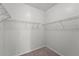 Large walk-in closet with wire shelving at 3362 Robert Trent Jones Dr # 30307, Orlando, FL 32835