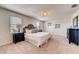 Spacious bedroom with carpeted floors and large bed at 3814 Royal Azalea Way, Sanford, FL 32773