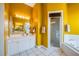 Bright bathroom with shower and double vanity at 412 Vista Dr, Davenport, FL 33897