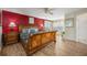 Spacious bedroom with wood flooring and a king-size bed at 412 Vista Dr, Davenport, FL 33897