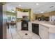 Well-equipped kitchen featuring stainless steel appliances and an eat-in area at 412 Vista Dr, Davenport, FL 33897