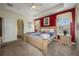 Large main bedroom featuring a king-size bed and ample closet space at 412 Vista Dr, Davenport, FL 33897
