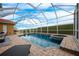 Screened pool and spa with ample deck space at 412 Vista Dr, Davenport, FL 33897