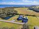 Stunning waterfront property; expansive home with pool and detached garage at 4510 Packard S Ave, St Cloud, FL 34772