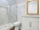 Spa-like bathroom with marble shower and gold-framed mirror at 4510 Packard S Ave, St Cloud, FL 34772