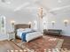 Bright and airy bedroom with a comfortable sitting area at 4510 Packard S Ave, St Cloud, FL 34772