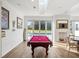 Bright game room with pool table and access to backyard at 4510 Packard S Ave, St Cloud, FL 34772