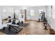Spacious home gym with various equipment and mirrored wall at 4510 Packard S Ave, St Cloud, FL 34772
