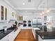 Open concept kitchen with eat-in island and professional-grade appliances at 4510 Packard S Ave, St Cloud, FL 34772
