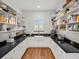 Walk-in pantry with ample shelving for food storage at 4510 Packard S Ave, St Cloud, FL 34772