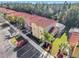 Community view showing townhome row and surrounding landscape at 4732 Vero Beach Pl, Kissimmee, FL 34746