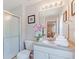 Clean bathroom with shower, toilet, and vanity at 4732 Vero Beach Pl, Kissimmee, FL 34746