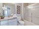 Clean bathroom with tub shower combo, vanity, and toilet at 4732 Vero Beach Pl, Kissimmee, FL 34746