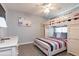 Bedroom with a bunk bed and a full-size bed at 4732 Vero Beach Pl, Kissimmee, FL 34746