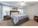 Spacious bedroom with king-size bed and nightstands at 4732 Vero Beach Pl, Kissimmee, FL 34746