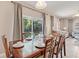 Bright dining area with table and chairs, view of pool at 4732 Vero Beach Pl, Kissimmee, FL 34746