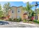 Two-story townhome features appealing facade and landscaping at 4732 Vero Beach Pl, Kissimmee, FL 34746