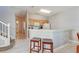 Kitchen features breakfast bar and access to adjoining areas at 4732 Vero Beach Pl, Kissimmee, FL 34746