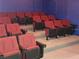 Community theater room with many comfortable seats at 4732 Vero Beach Pl, Kissimmee, FL 34746