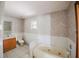 Full bathroom with a vanity, toilet, tub, and a neutral color scheme at 585 Gasline Rd, Deland, FL 32724
