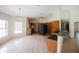 Open kitchen concept with tiled floors, wood cabinetry, and a spacious layout for cooking and entertaining at 585 Gasline Rd, Deland, FL 32724