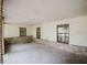 A well-lit porch area with classic brick detailing, enhanced by multiple windows and offering lots of natural light at 585 Gasline Rd, Deland, FL 32724