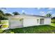 View of house exterior, showcasing the backyard at 6120 Denson Dr, Orlando, FL 32808