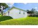 House exterior with grassy yard and fence at 6120 Denson Dr, Orlando, FL 32808