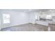 Bright and spacious living area with tile floors at 6120 Denson Dr, Orlando, FL 32808
