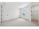 Neutral bedroom with a window view and a closet in a modern home at 6232 Trailblaze Bnd, St Cloud, FL 34771