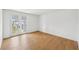 Well-lit bedroom featuring wood floors and private balcony access at 6232 Trailblaze Bnd, St Cloud, FL 34771