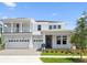 Beautiful two-story home with a three-car garage and eye-catching balcony at 6232 Trailblaze Bnd, St Cloud, FL 34771