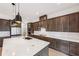 Modern kitchen with stainless steel appliances and a large center island at 6232 Trailblaze Bnd, St Cloud, FL 34771