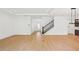 Spacious living room with staircase and elegant chandelier at 6232 Trailblaze Bnd, St Cloud, FL 34771