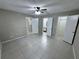 Large bedroom with two closets and ceiling fan at 629 Dory Ln # 202, Altamonte Springs, FL 32714