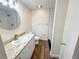 Updated bathroom with white subway tiles, a walk-in shower, and new vanity at 654 Harbor Villa Ct, Clermont, FL 34711