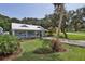 Charming house exterior with well-maintained landscaping at 801 E 8Th Ave, New Smyrna Beach, FL 32169