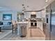 Modern kitchen with stainless steel appliances and white shaker cabinets at 801 E 8Th Ave, New Smyrna Beach, FL 32169