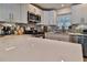 Modern kitchen featuring white cabinets and quartz countertops at 801 E 8Th Ave, New Smyrna Beach, FL 32169