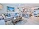 Modern kitchen boasts stainless steel appliances and an island with seating at 801 E 8Th Ave, New Smyrna Beach, FL 32169