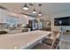 White kitchen with quartz countertops and stainless steel appliances at 801 E 8Th Ave, New Smyrna Beach, FL 32169